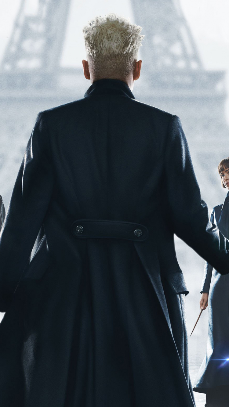 Homme en Manteau Noir Debout à Côté de Femme en Manteau Noir. Wallpaper in 750x1334 Resolution