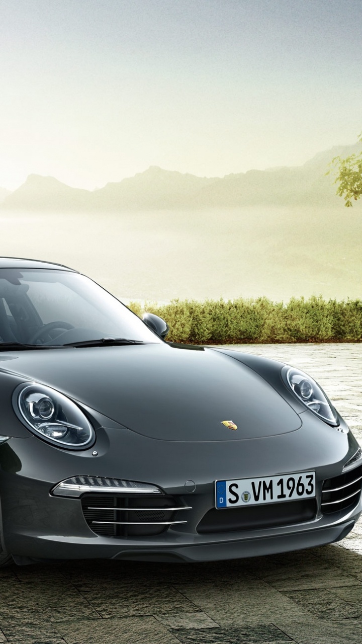 Porsche 911 Noire Sur Route. Wallpaper in 720x1280 Resolution