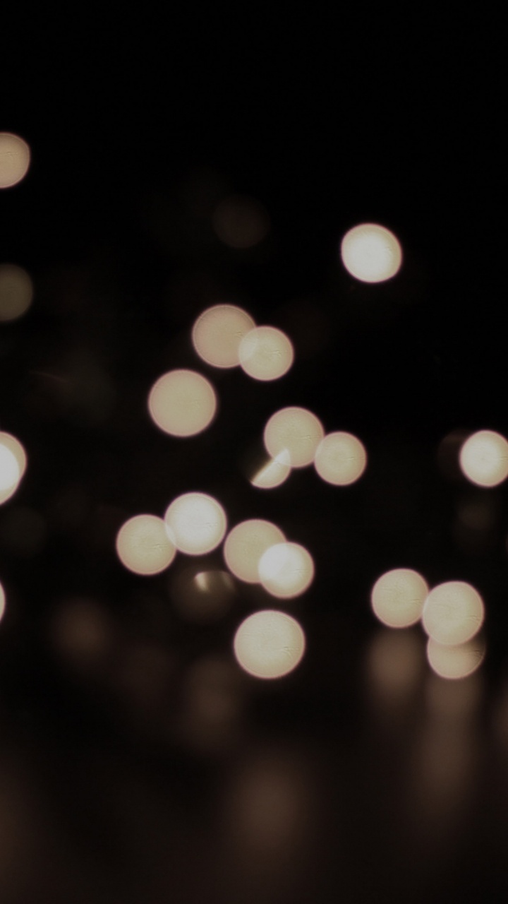 Luces Bokeh Blancas y Amarillas. Wallpaper in 720x1280 Resolution