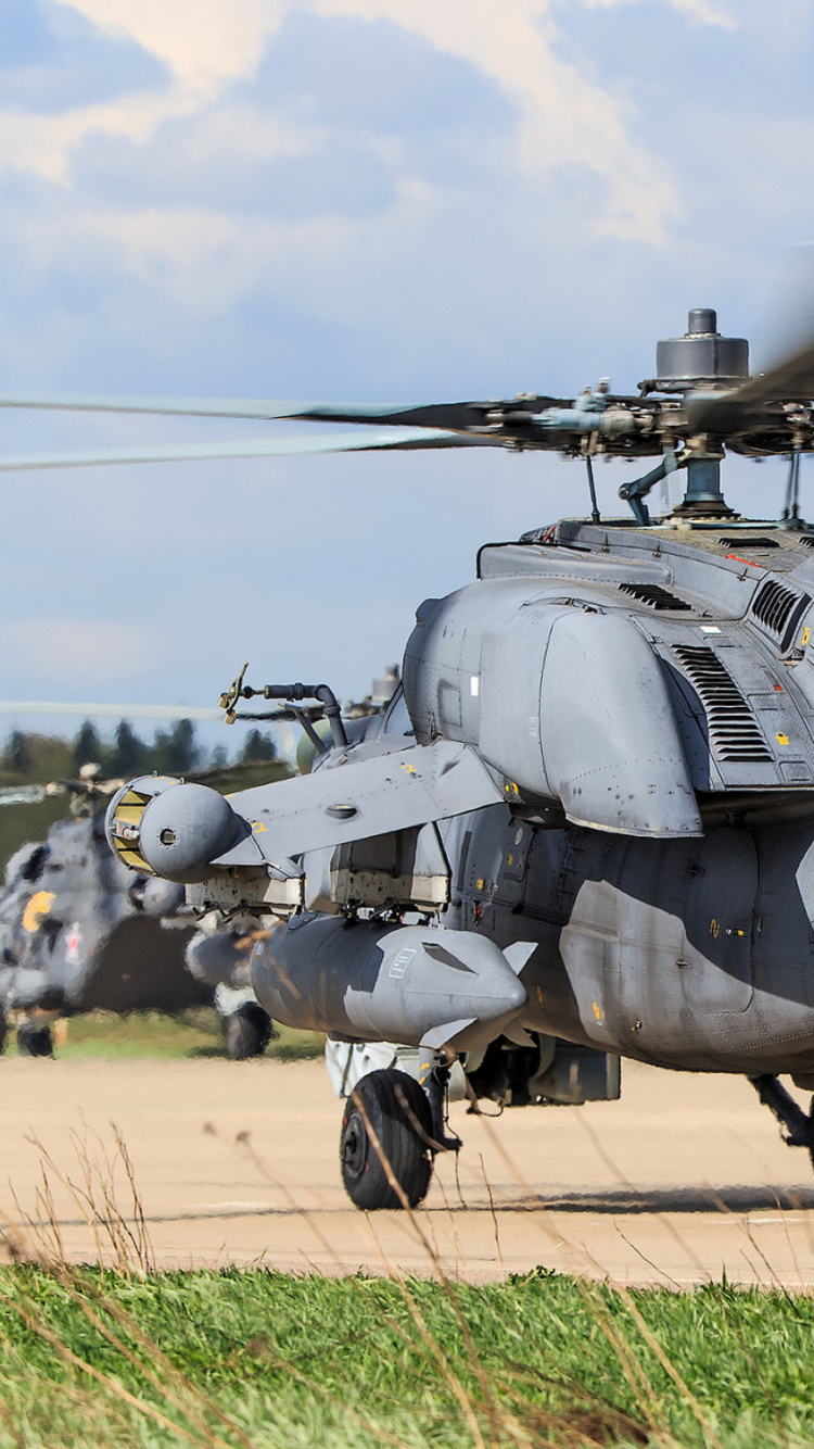 Gray Fighter Plane on Brown Field During Daytime. Wallpaper in 750x1334 Resolution