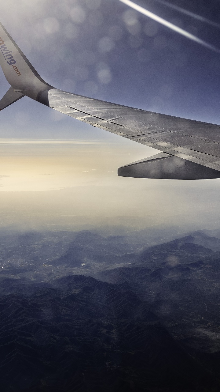 Ala de Avión Sobre Nubes Blancas Durante el Día. Wallpaper in 720x1280 Resolution