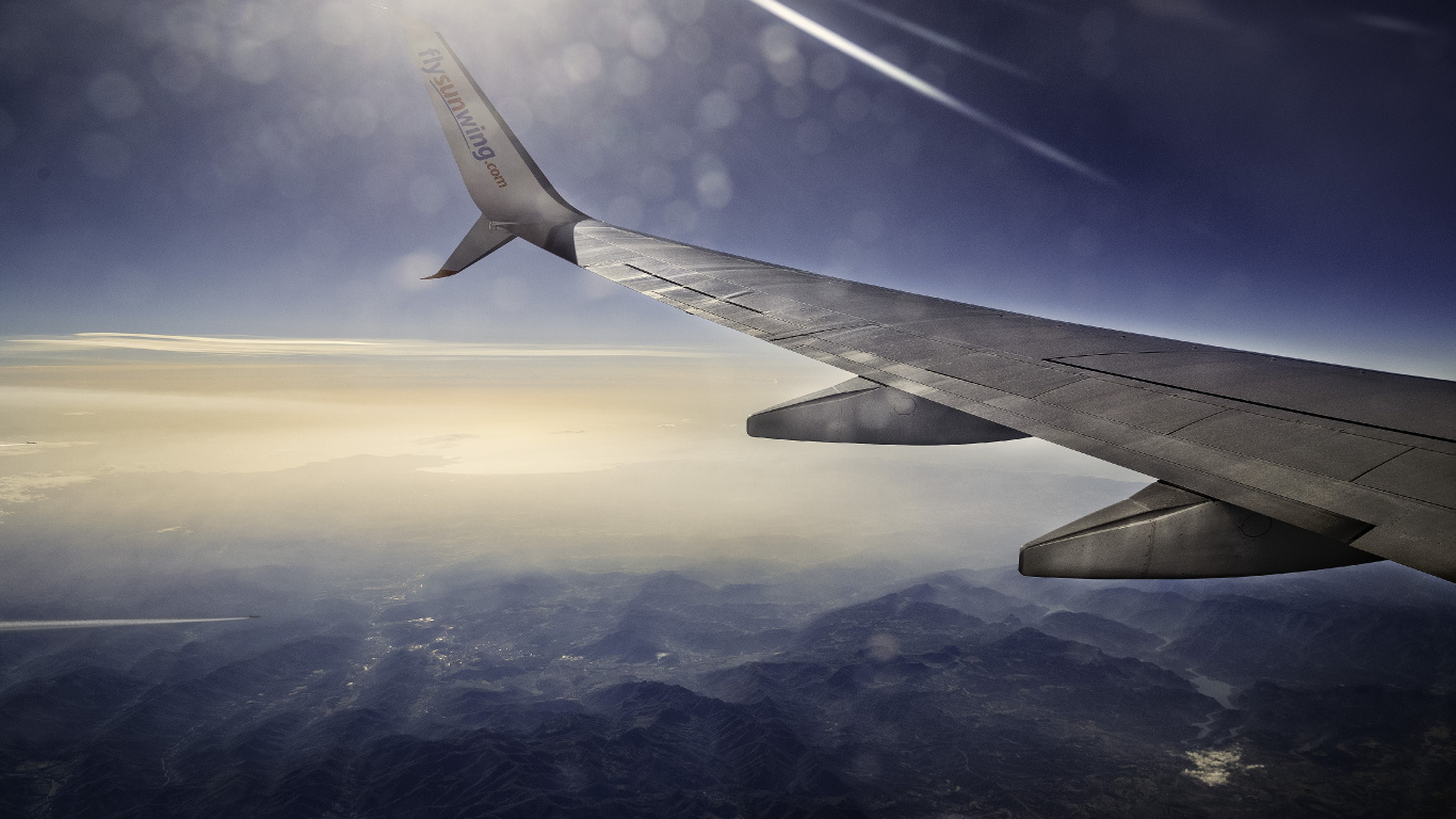Airplane Wing Over White Clouds During Daytime. Wallpaper in 1366x768 Resolution