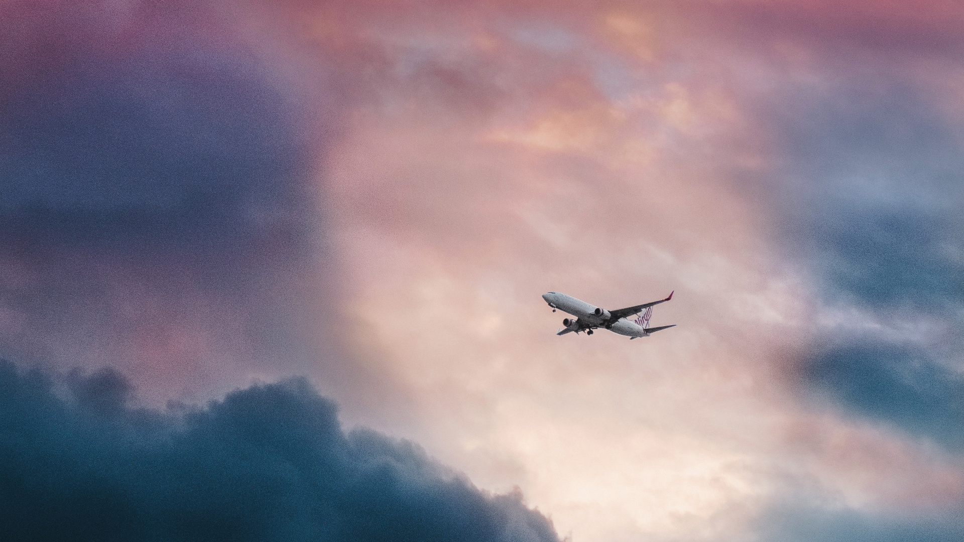 White Airplane Flying Over Clouds. Wallpaper in 1920x1080 Resolution