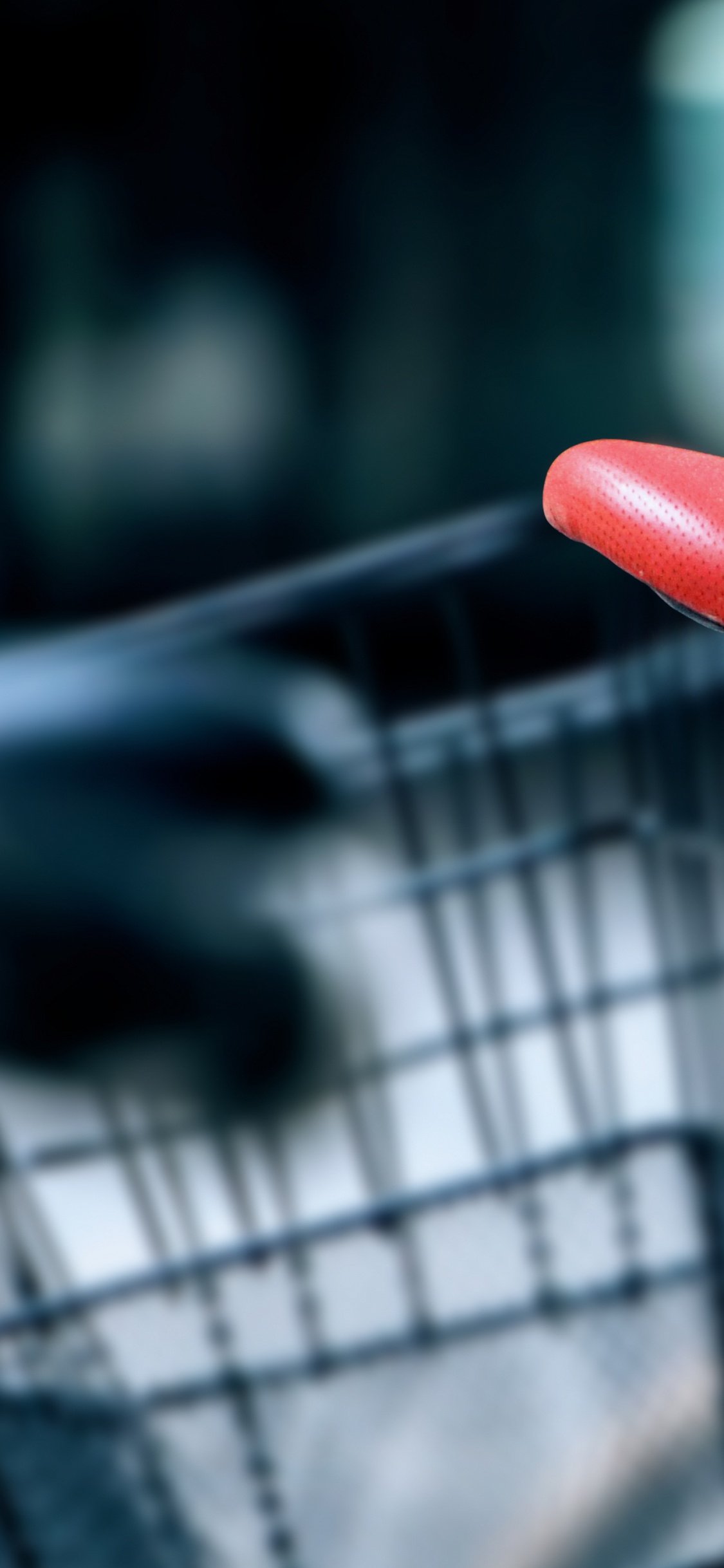 Blue and Red Bicycle in Tilt Shift Lens. Wallpaper in 1125x2436 Resolution