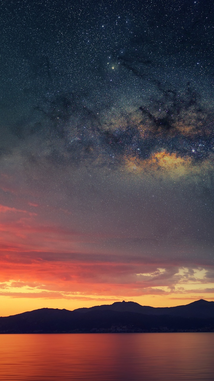 Plan D'eau Sous Ciel Bleu. Wallpaper in 720x1280 Resolution