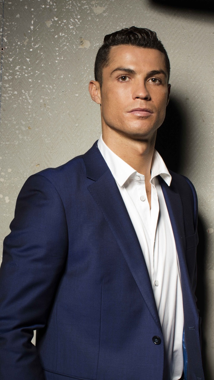 Man in Blue Suit Jacket Standing Beside Black Wall. Wallpaper in 720x1280 Resolution