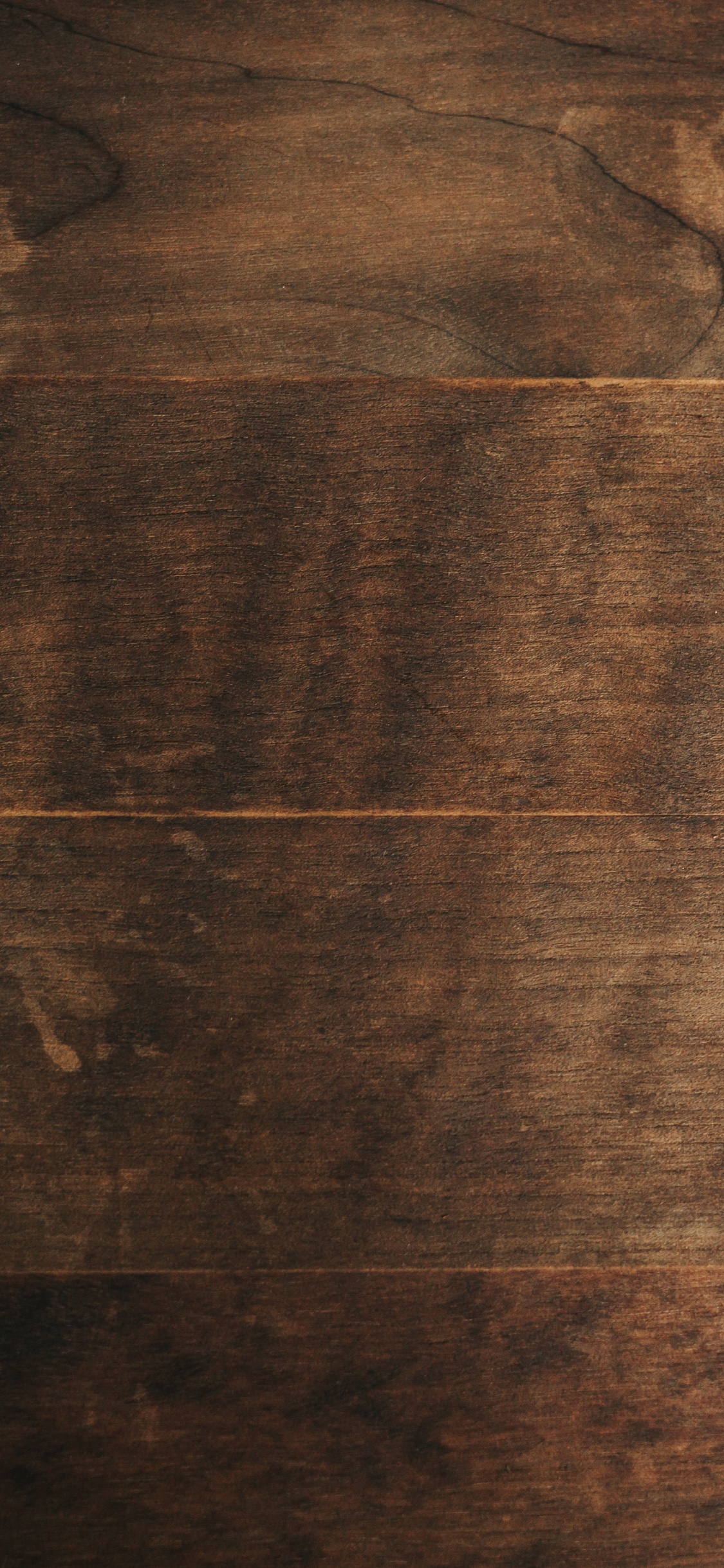 Superficie de Madera Marrón y Negra. Wallpaper in 1125x2436 Resolution