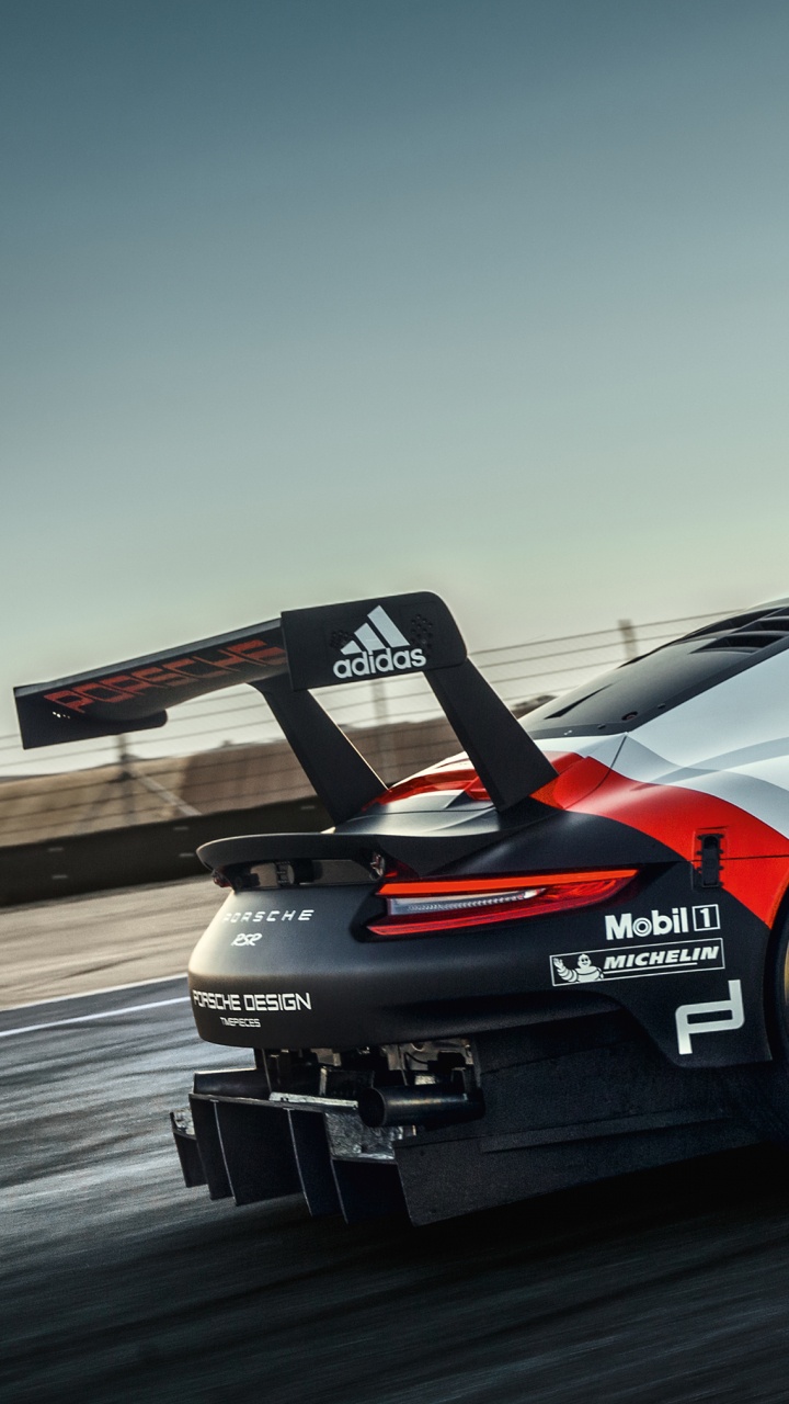 Weiß-roter Porsche 911 Unterwegs. Wallpaper in 720x1280 Resolution