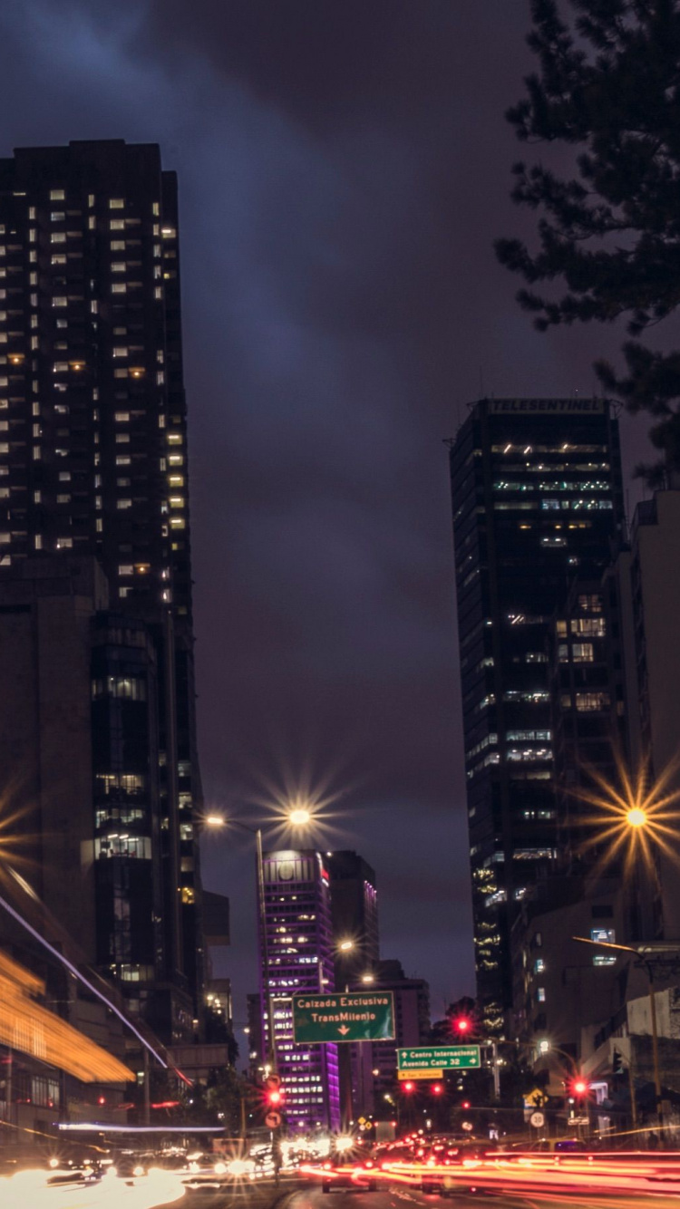 City Buildings During Night Time. Wallpaper in 750x1334 Resolution