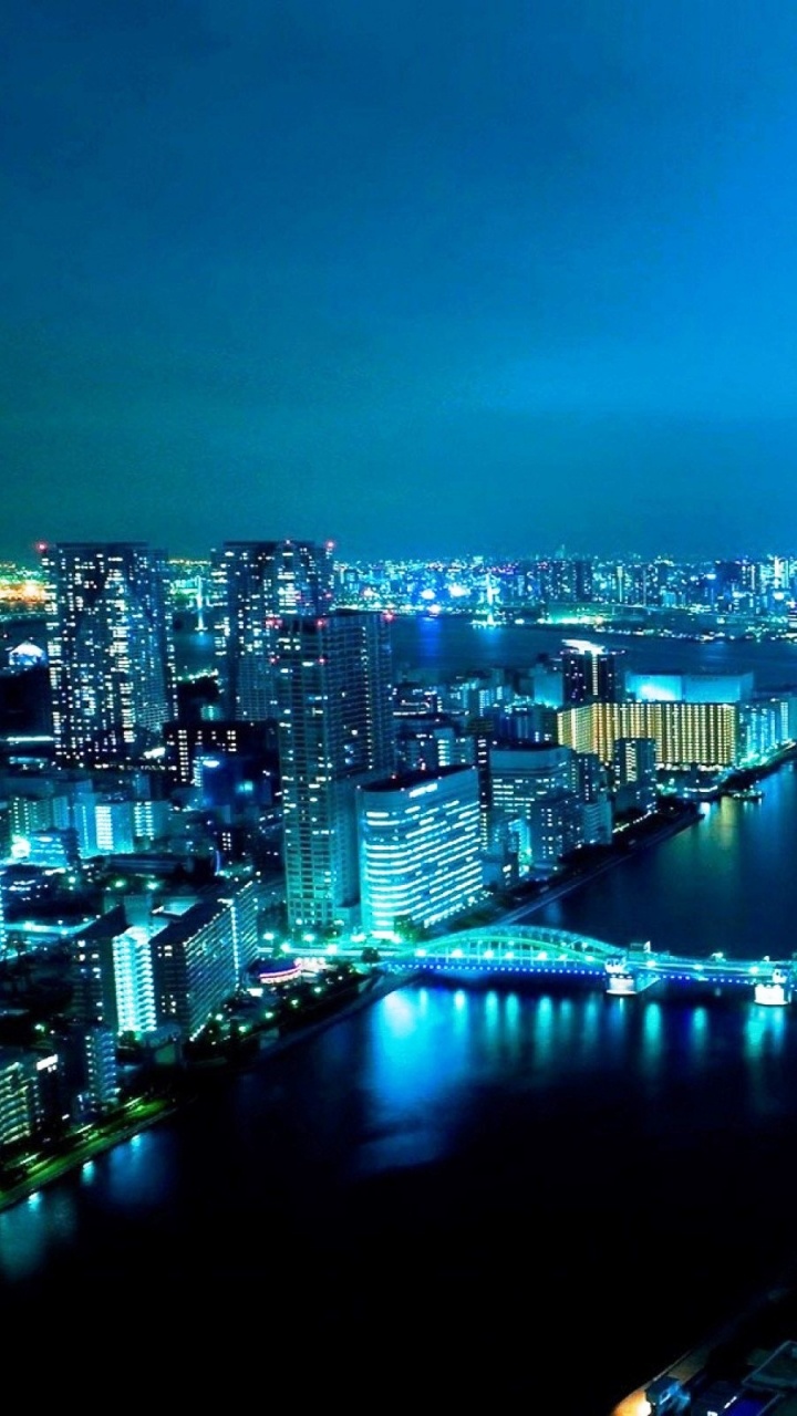 City Skyline During Night Time. Wallpaper in 720x1280 Resolution