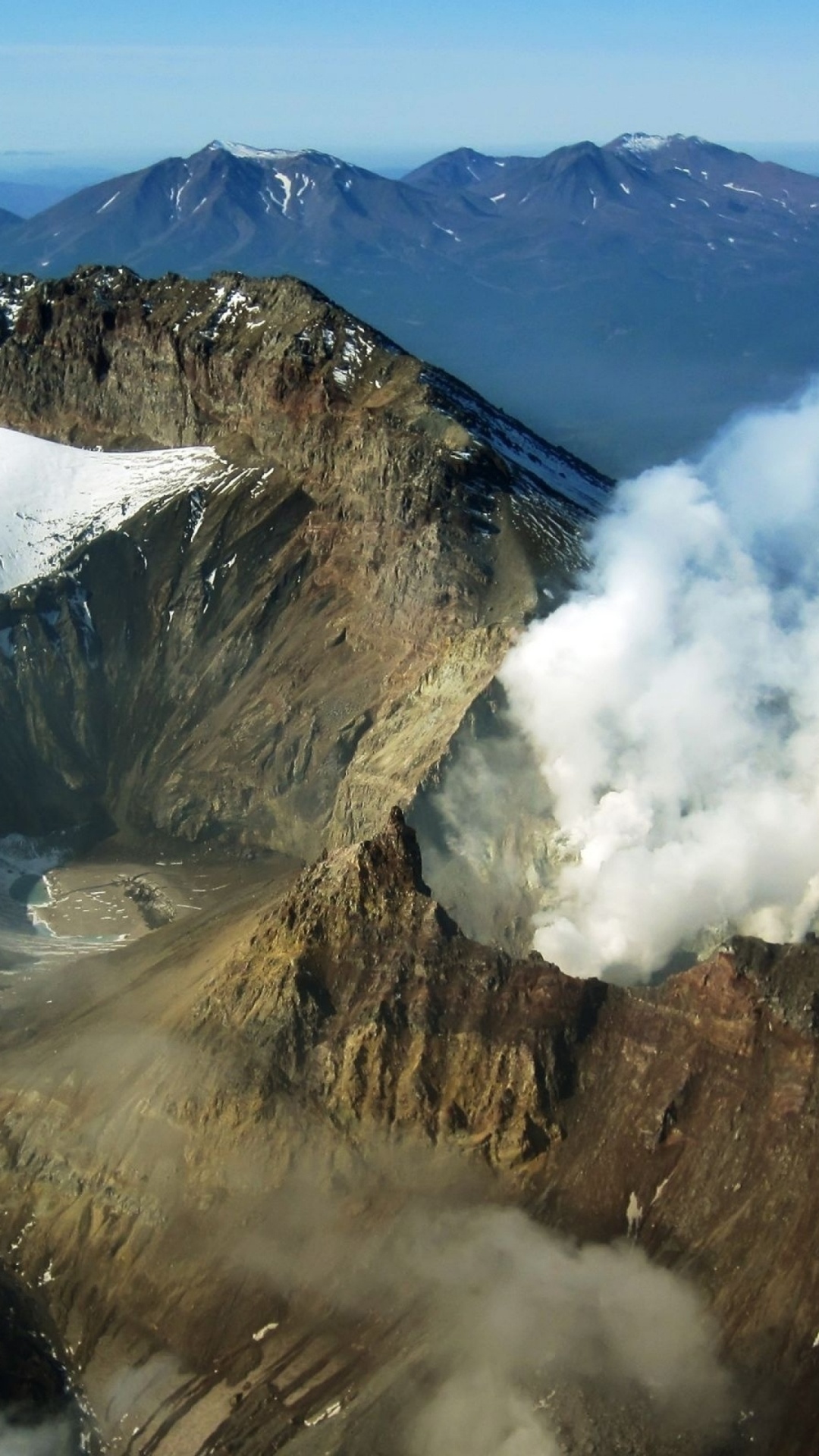 Aerial View of Mountain Covered With Snow During Daytime. Wallpaper in 1080x1920 Resolution