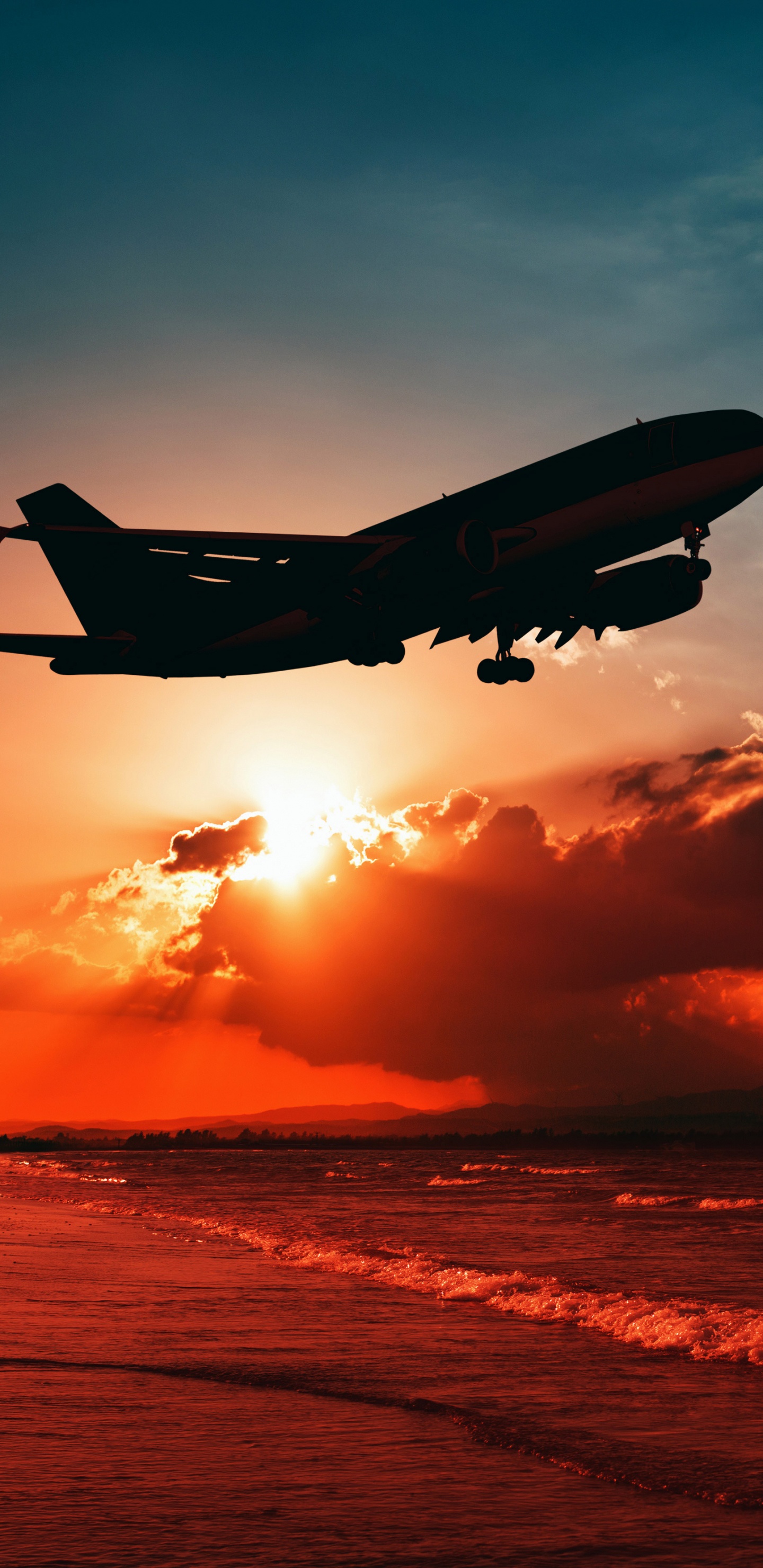 Avion Survolant Les Nuages au Coucher du Soleil. Wallpaper in 1440x2960 Resolution