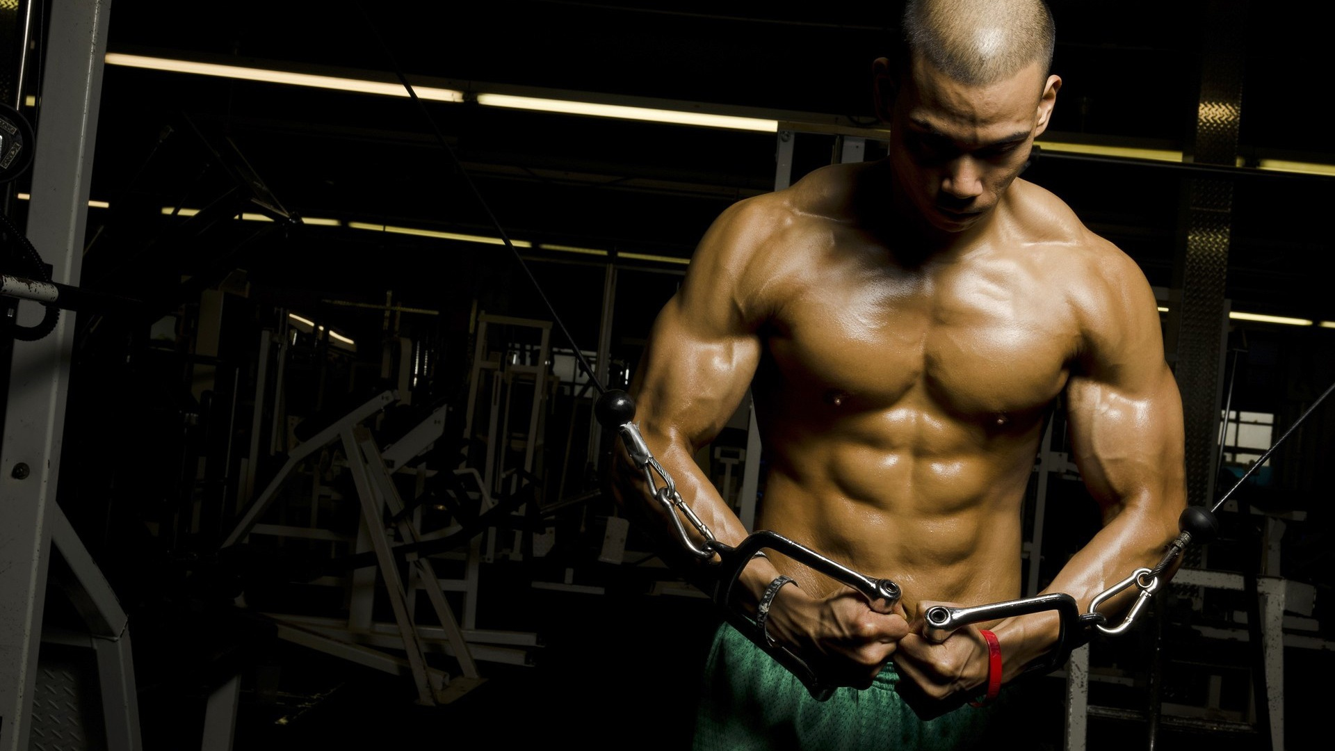 Topless Man in Black Shorts Holding Black and Red Exercise Equipment. Wallpaper in 1920x1080 Resolution