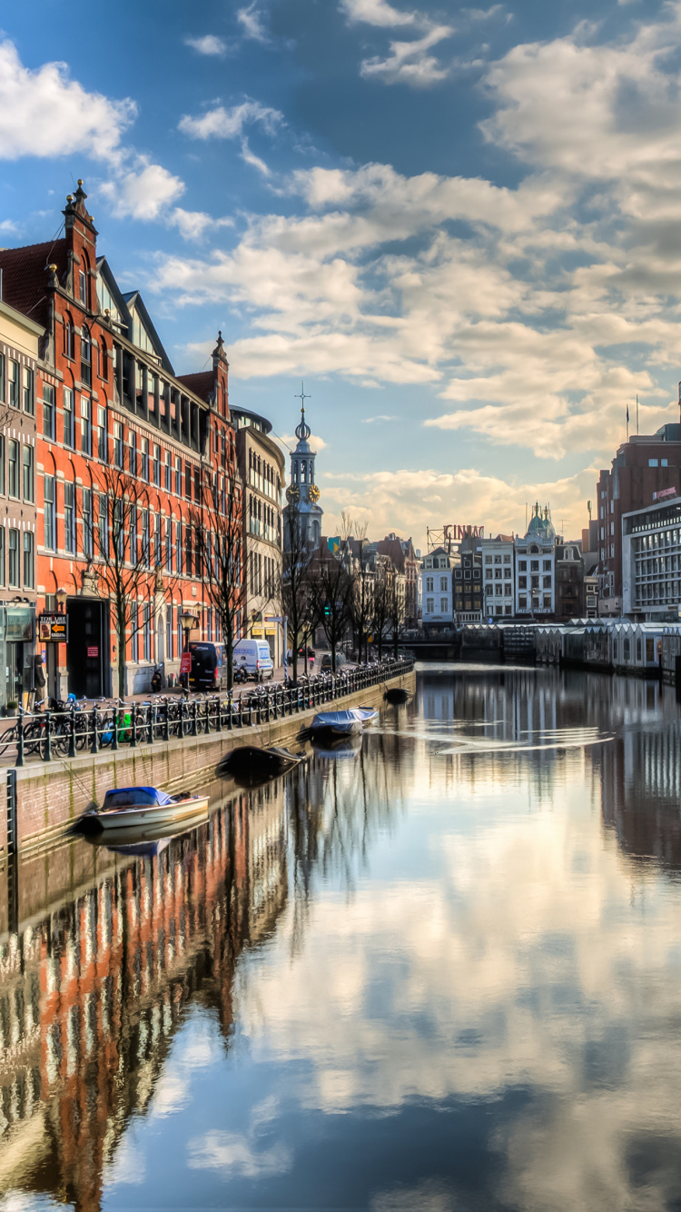 Body of Water Between Buildings Under Blue Sky During Daytime. Wallpaper in 750x1334 Resolution