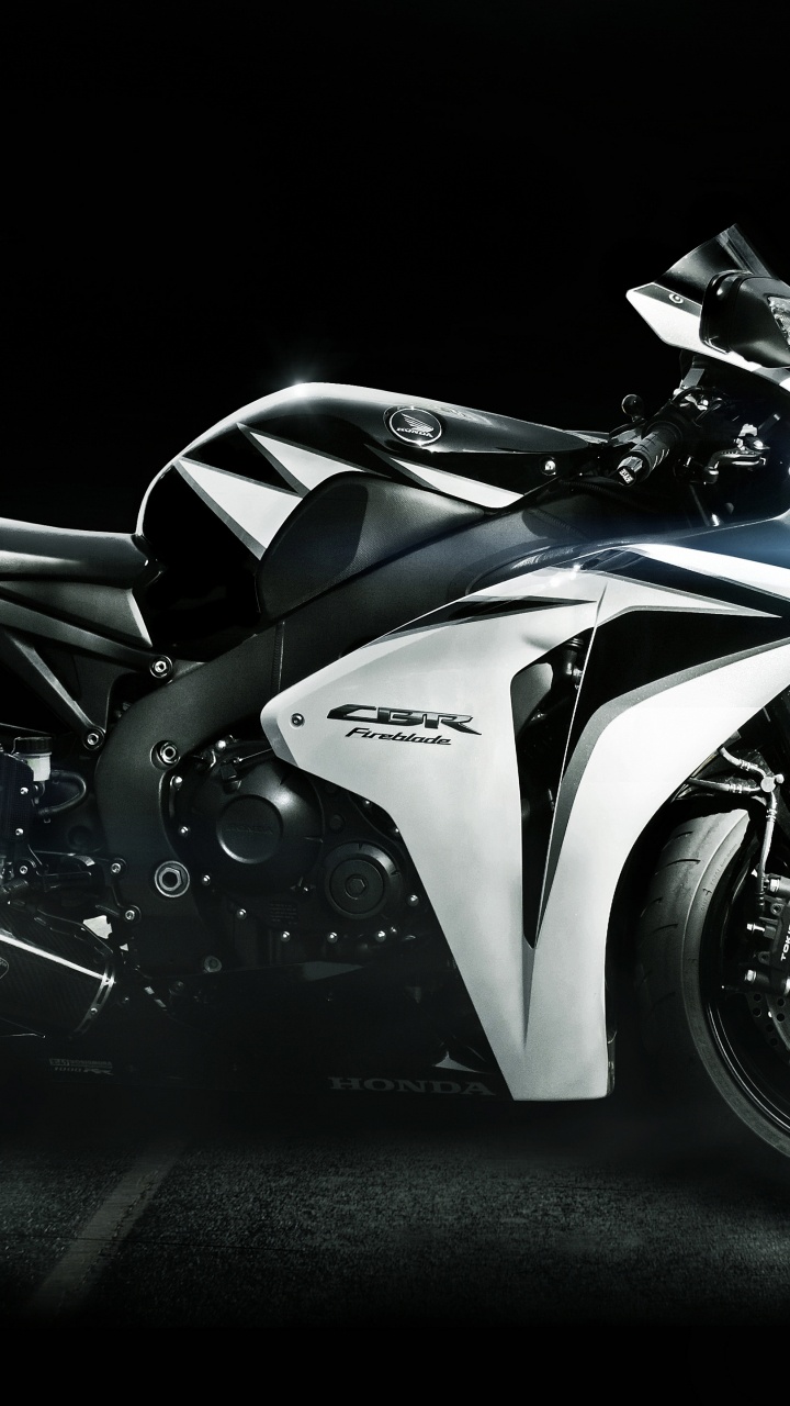 White and Black Sports Bike. Wallpaper in 720x1280 Resolution