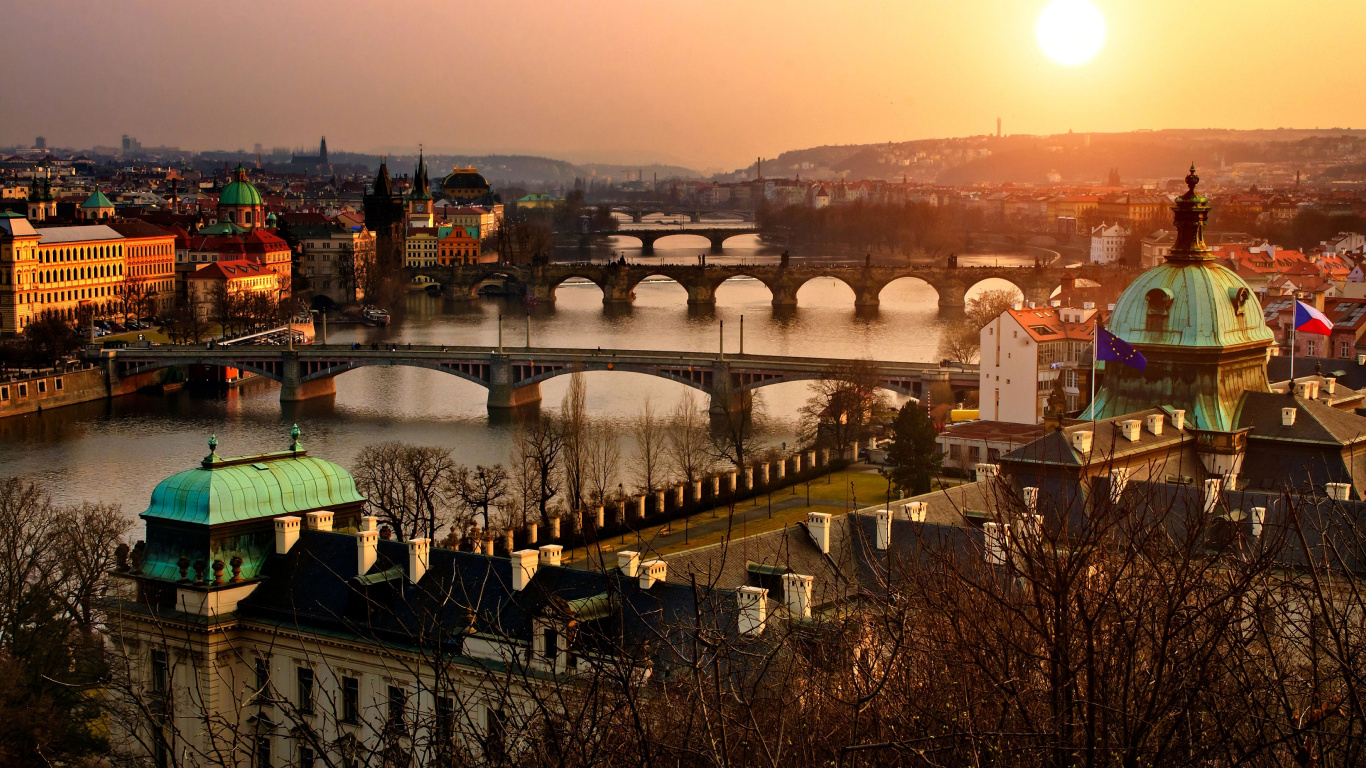 Brown Concrete Bridge Over River During Sunset. Wallpaper in 1366x768 Resolution