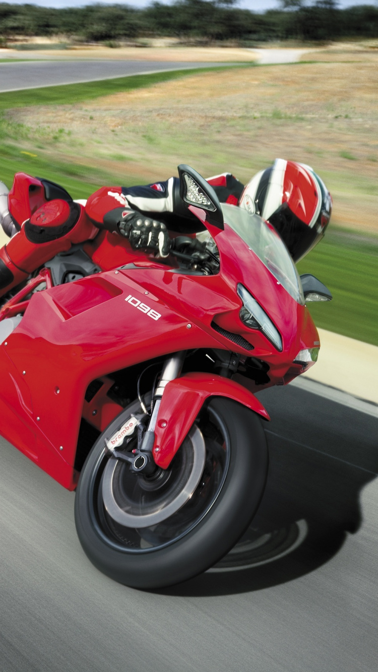 Red and Black Sports Bike on Road During Daytime. Wallpaper in 750x1334 Resolution