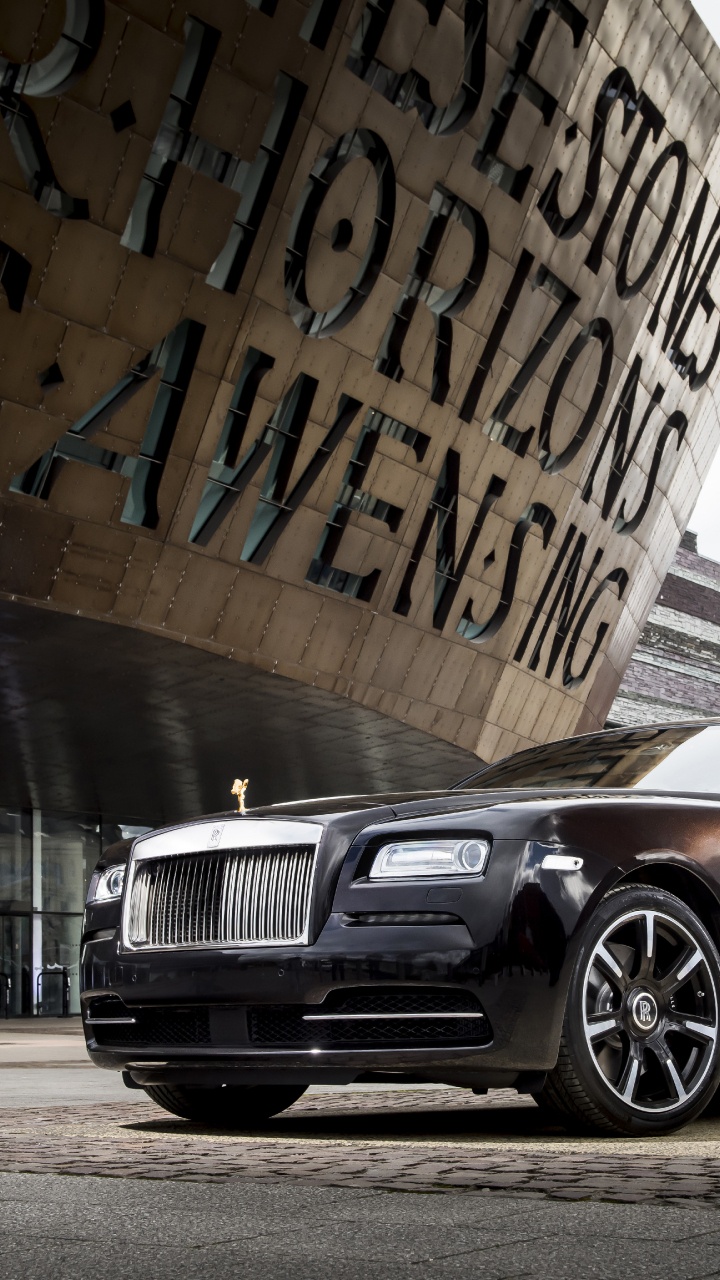 BMW M 3 Coupe Negro Estacionado Junto a la Pared Con Graffiti. Wallpaper in 720x1280 Resolution