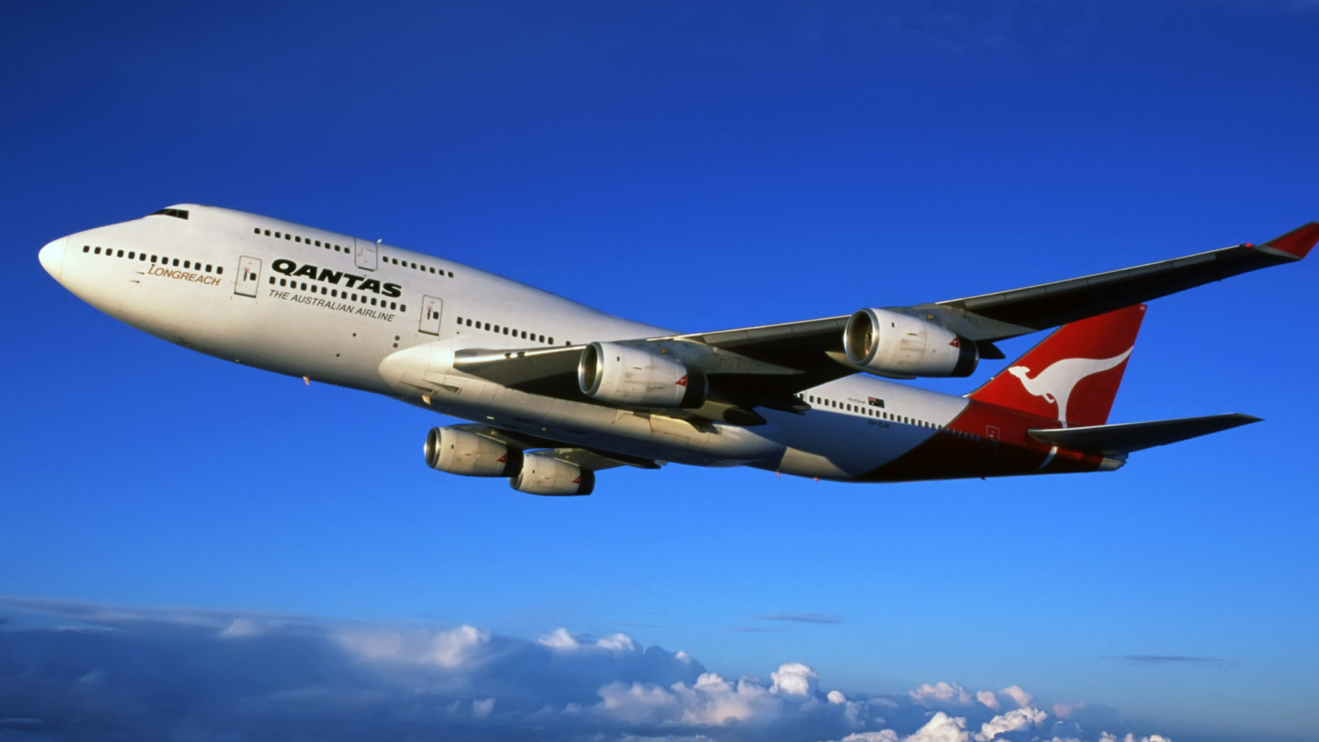 Avion Blanc et Rouge Dans Les Airs Pendant la Journée. Wallpaper in 1920x1080 Resolution