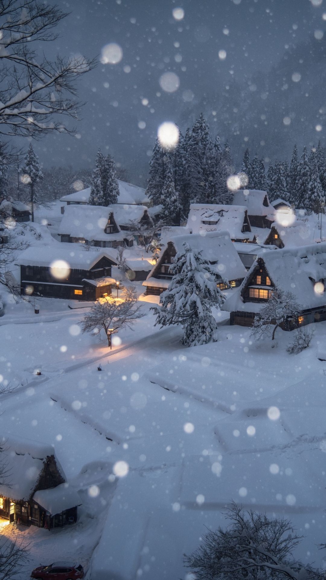 Maisons Couvertes de Neige Pendant la Nuit. Wallpaper in 1080x1920 Resolution