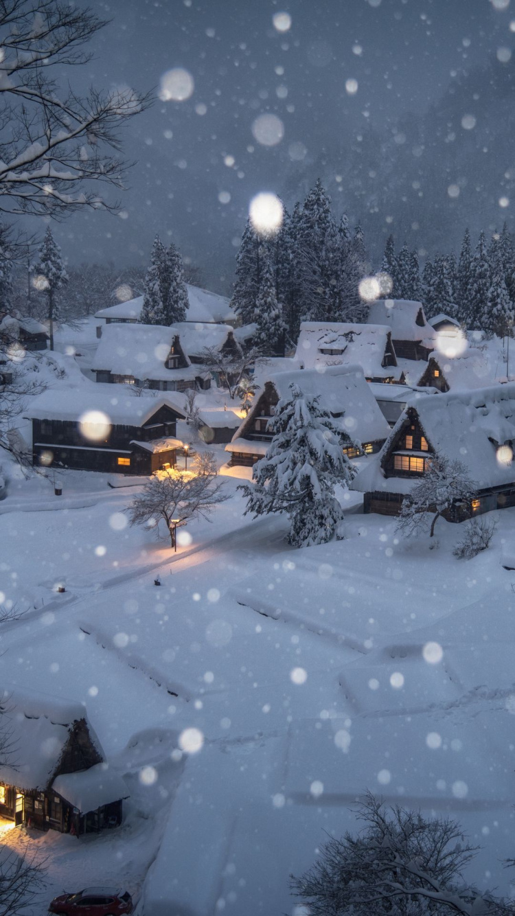 Maisons Couvertes de Neige Pendant la Nuit. Wallpaper in 750x1334 Resolution