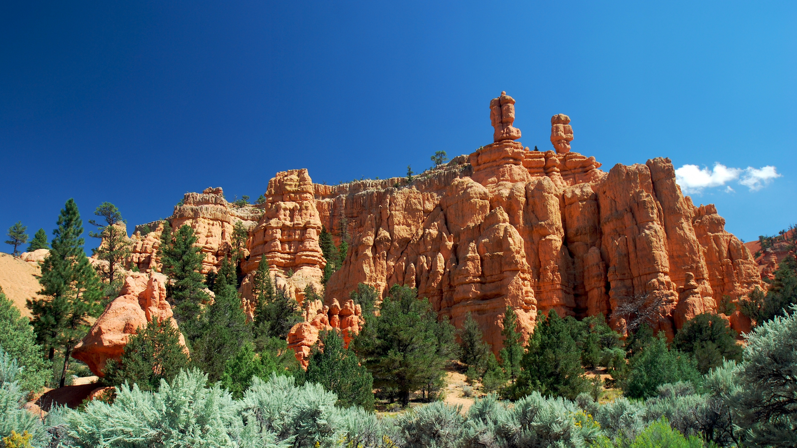Brown Rock Formation Under Blue Sky During Daytime. Wallpaper in 2560x1440 Resolution