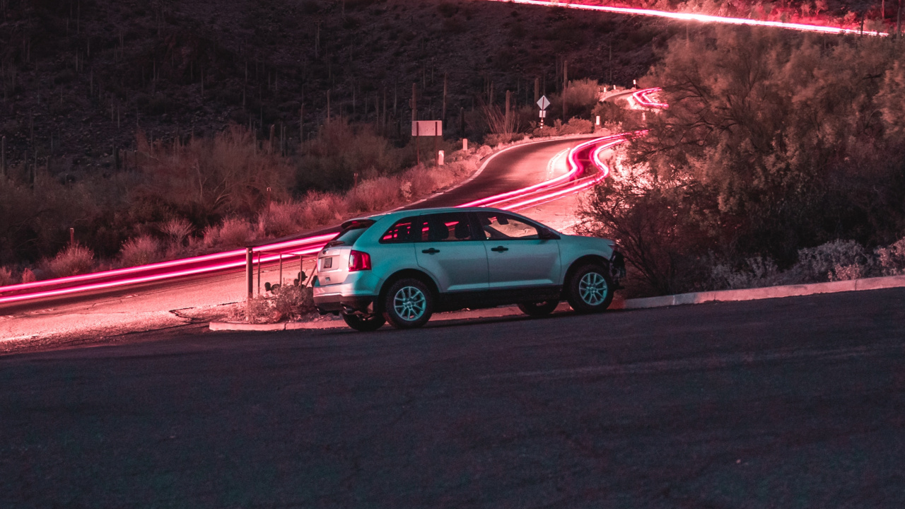 Red and White Suv on Road During Daytime. Wallpaper in 1280x720 Resolution