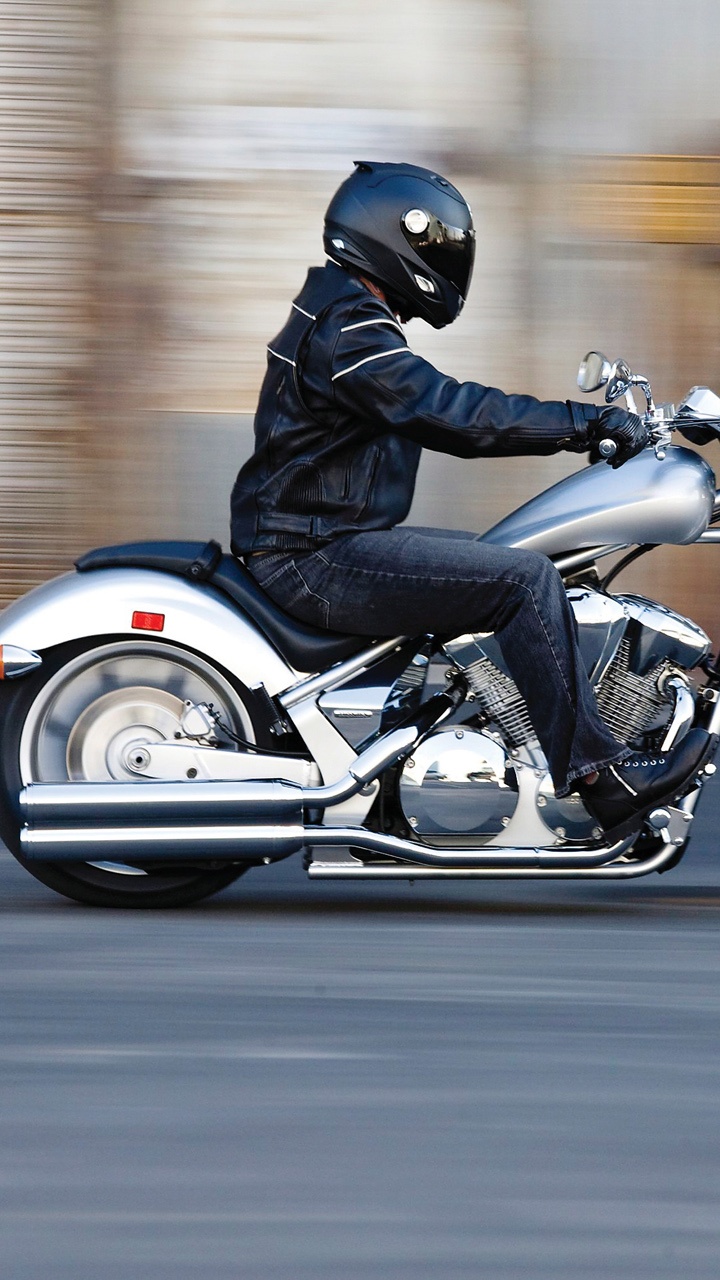 Man in Black Helmet Riding on White and Black Motorcycle. Wallpaper in 720x1280 Resolution