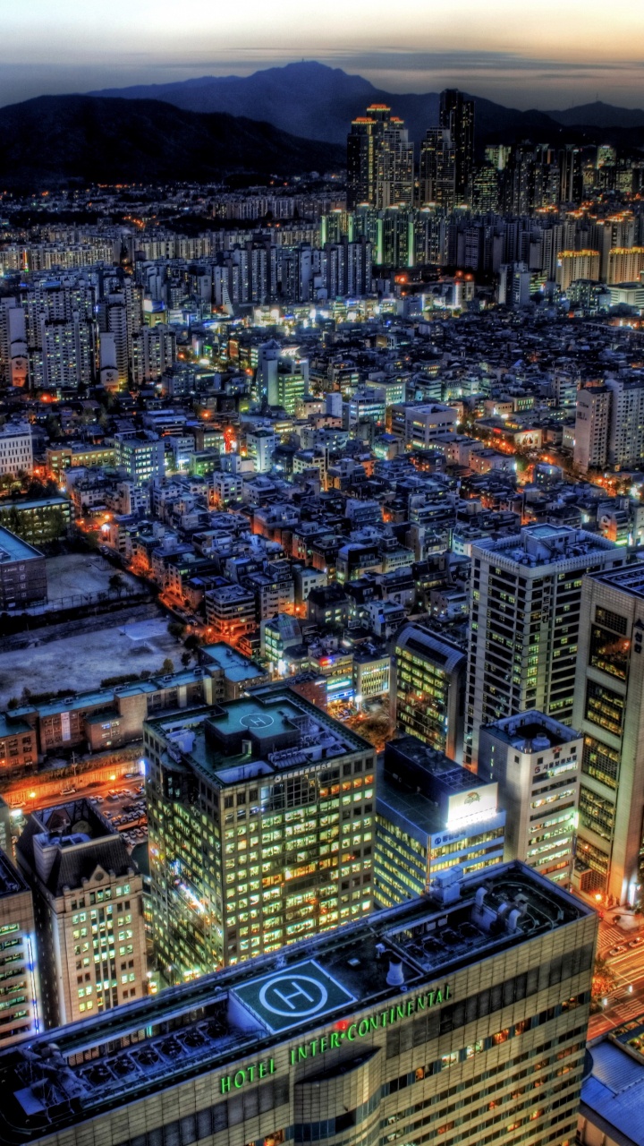 Aerial View of City Buildings During Night Time. Wallpaper in 720x1280 Resolution