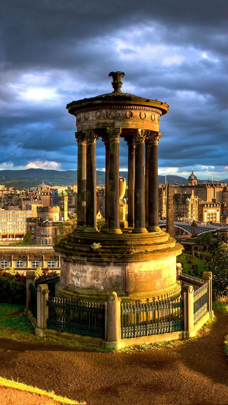 Brown Concrete Building Under Cloudy Sky During Daytime. Wallpaper in 750x1334 Resolution