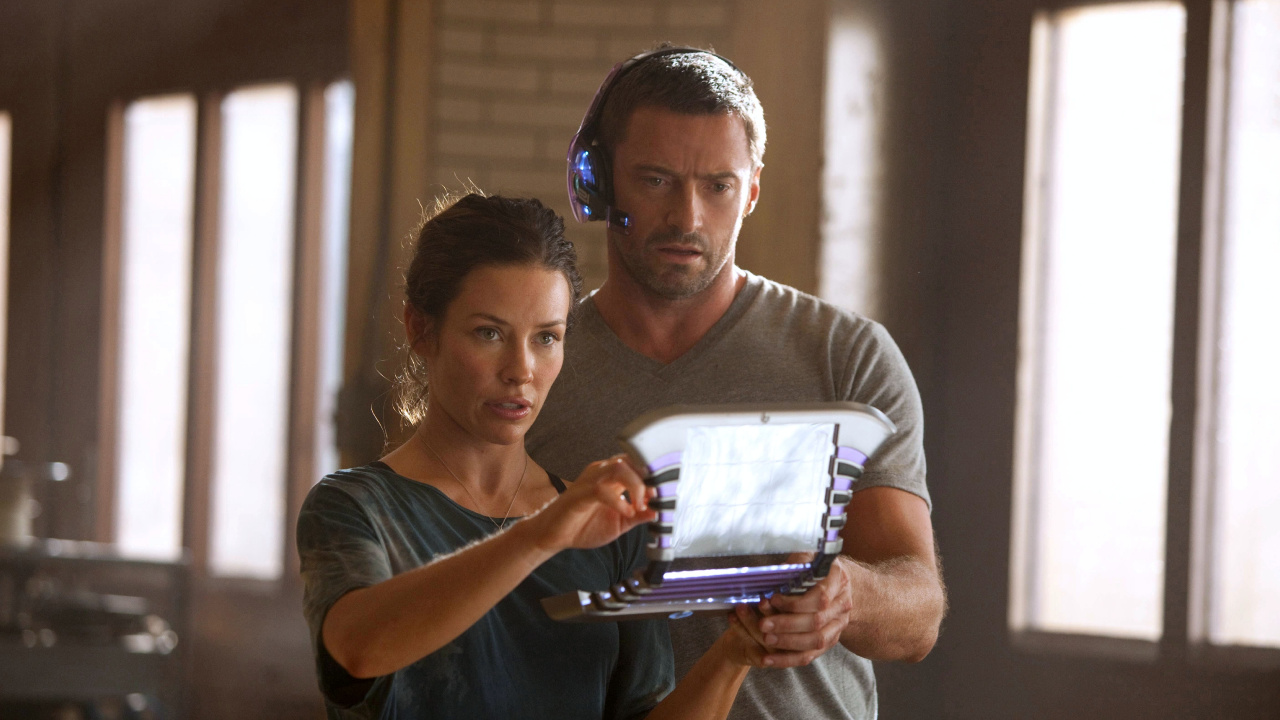 Woman in Black Tank Top Holding White Tablet Computer. Wallpaper in 1280x720 Resolution