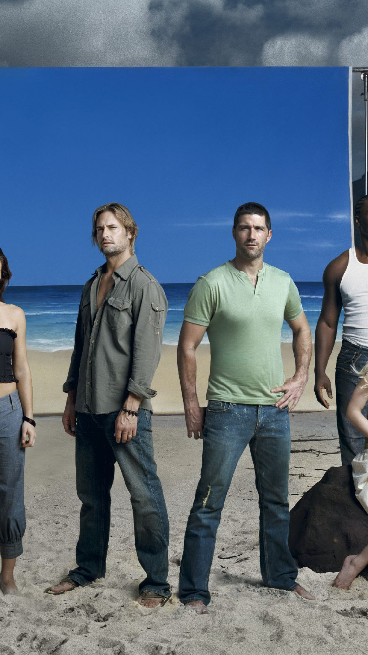 4 Men and 2 Women Standing on Beach Shore During Daytime. Wallpaper in 750x1334 Resolution