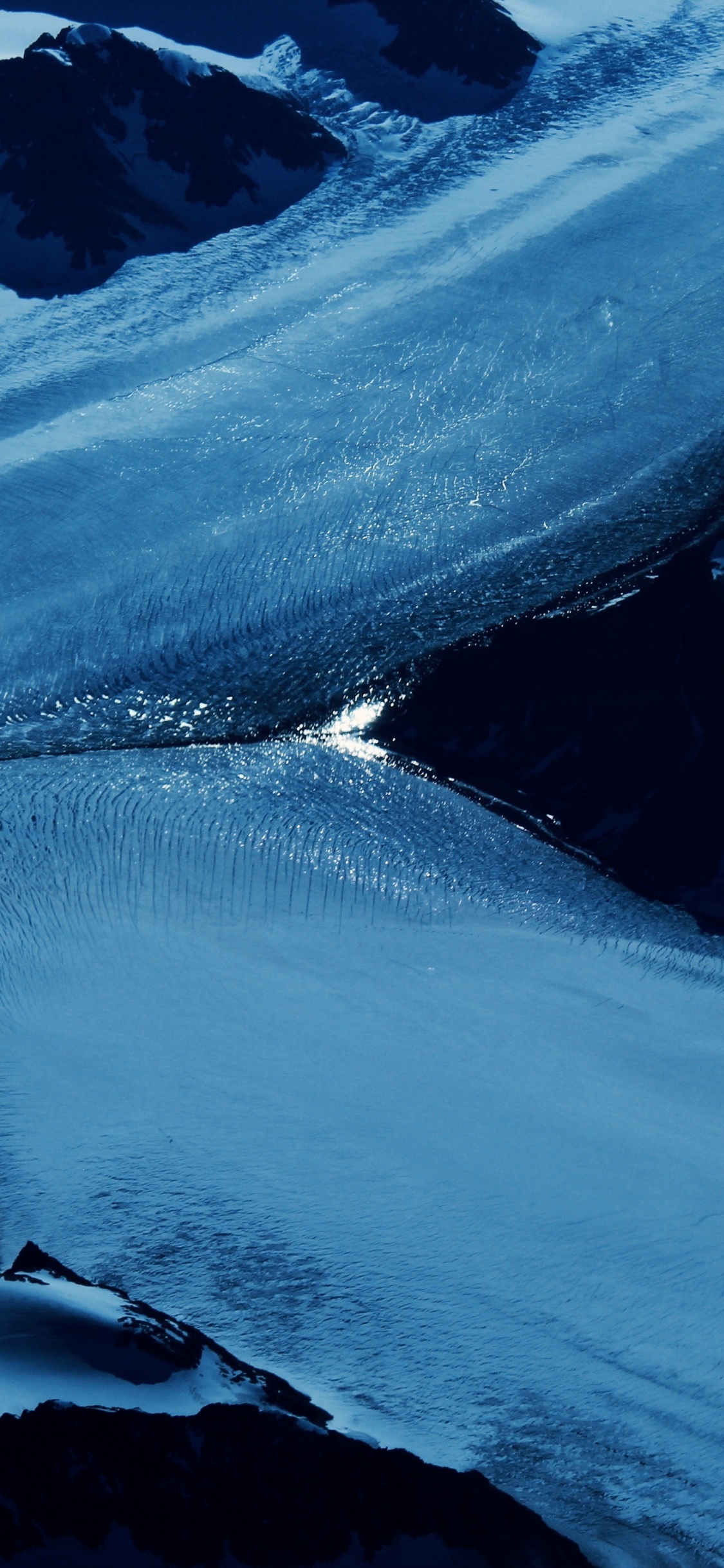 Snow Covered Mountain During Daytime. Wallpaper in 1125x2436 Resolution