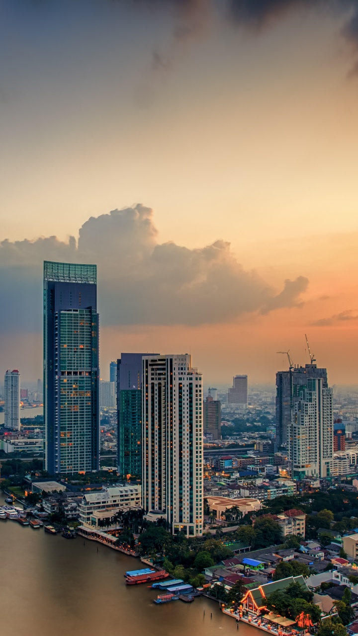 City Skyline Under Cloudy Sky During Daytime. Wallpaper in 720x1280 Resolution
