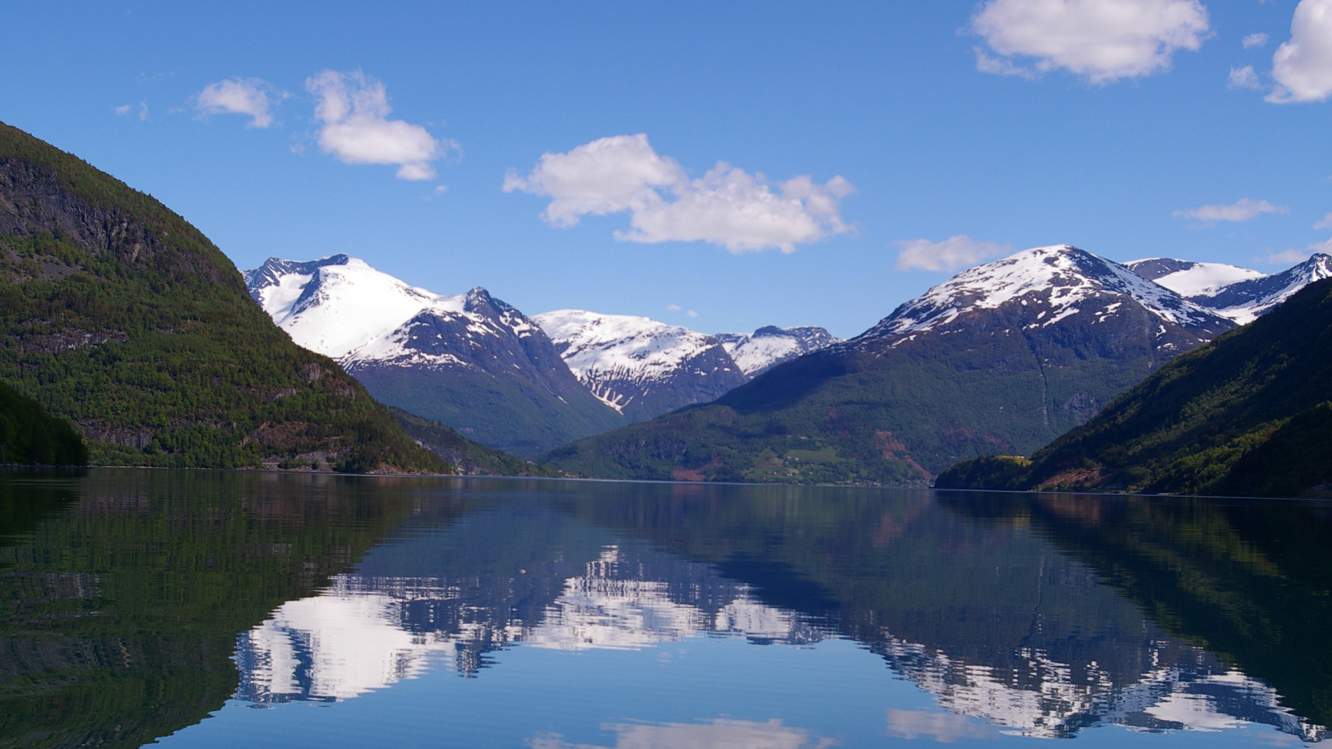 Snow Covered Mountain Near Lake Under Blue Sky During Daytime. Wallpaper in 1920x1080 Resolution