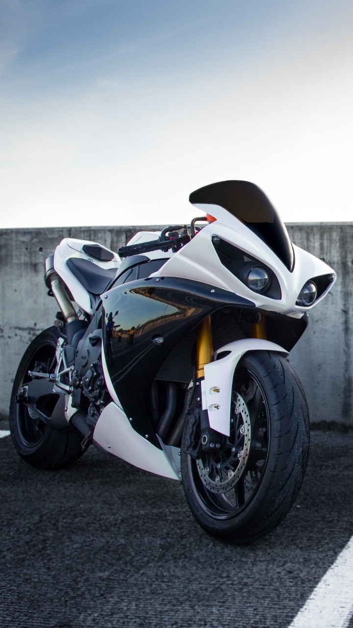 Black and White Sports Bike Parked on Gray Concrete Road During Daytime. Wallpaper in 720x1280 Resolution