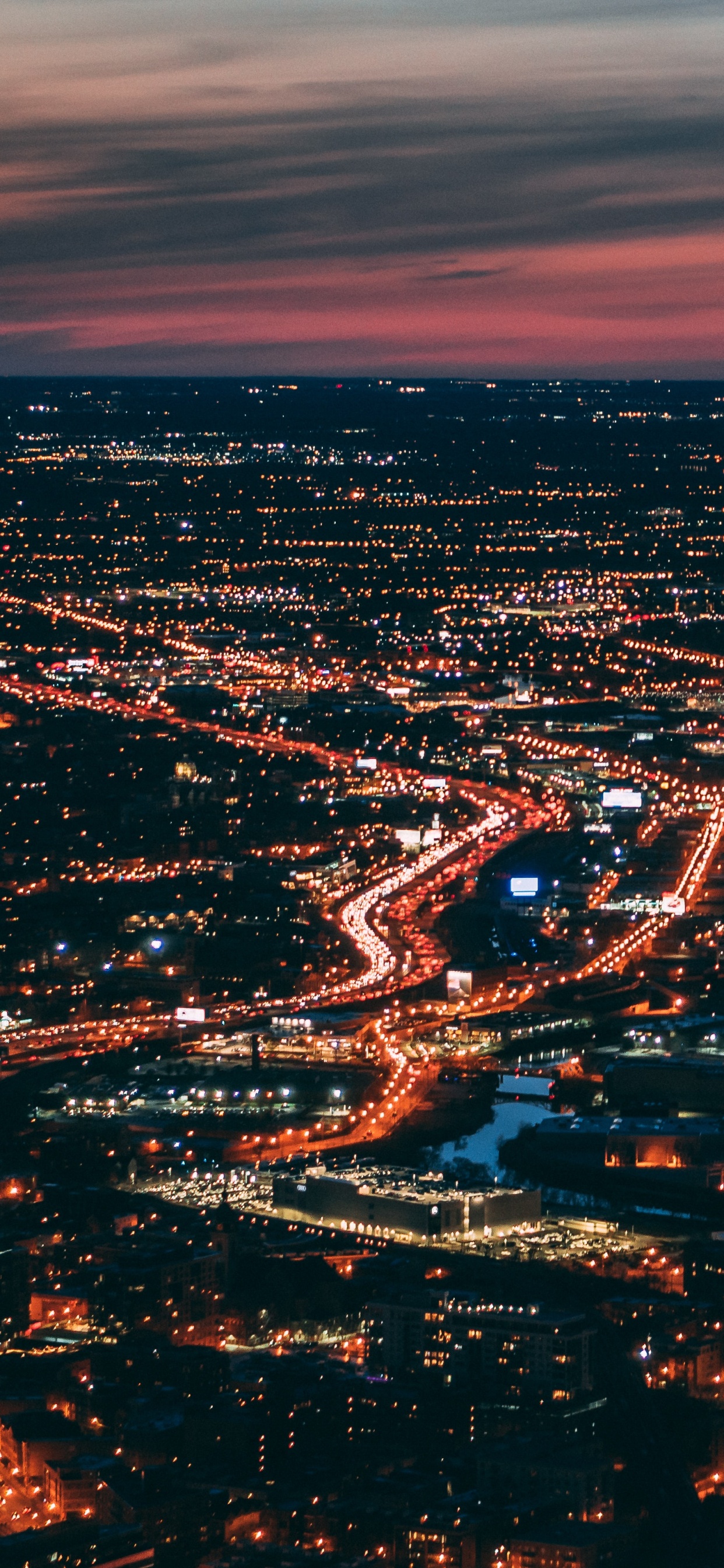 Aerial View of City During Night Time. Wallpaper in 1242x2688 Resolution