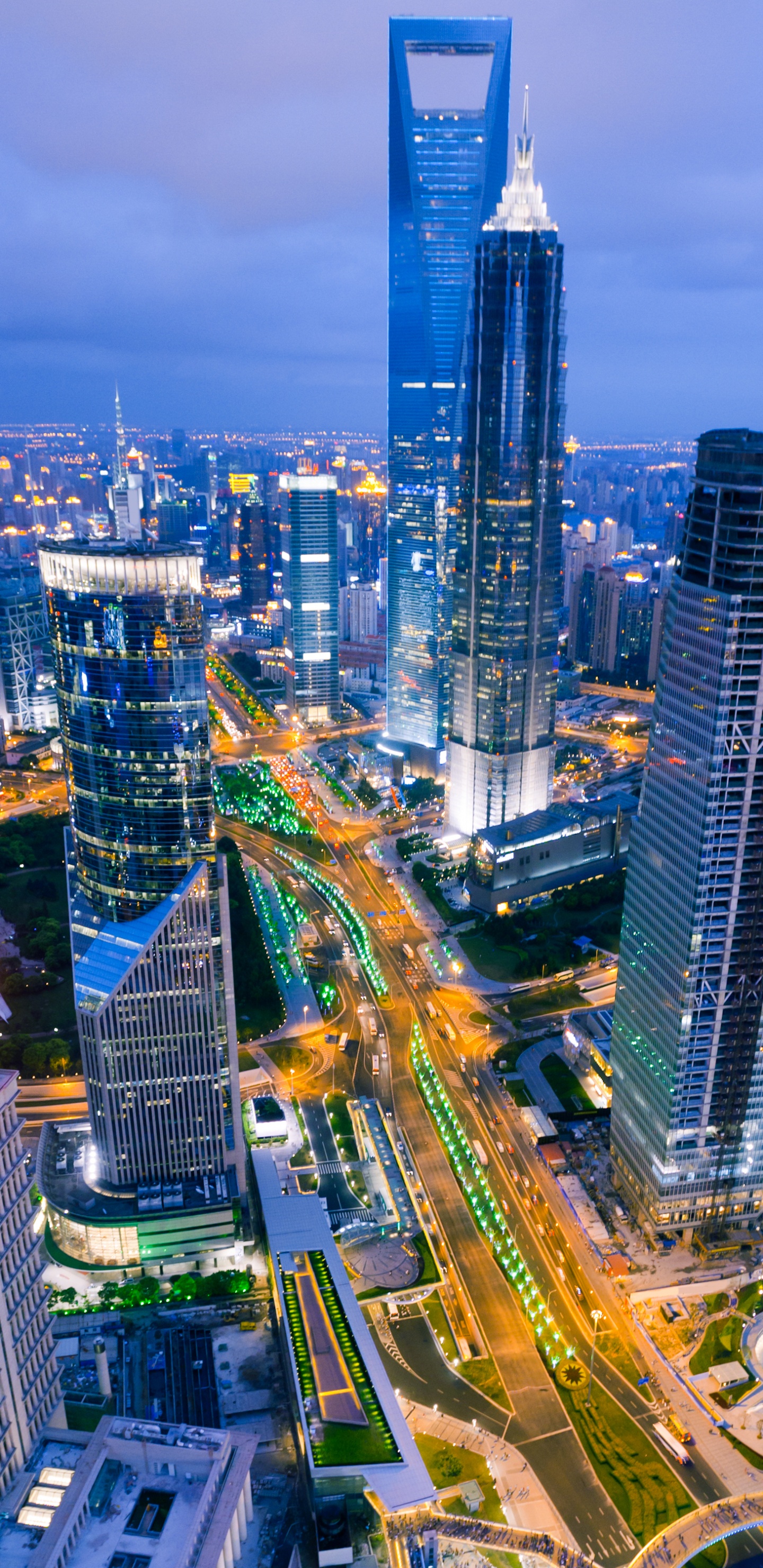 Aerial View of City Buildings During Night Time. Wallpaper in 1440x2960 Resolution