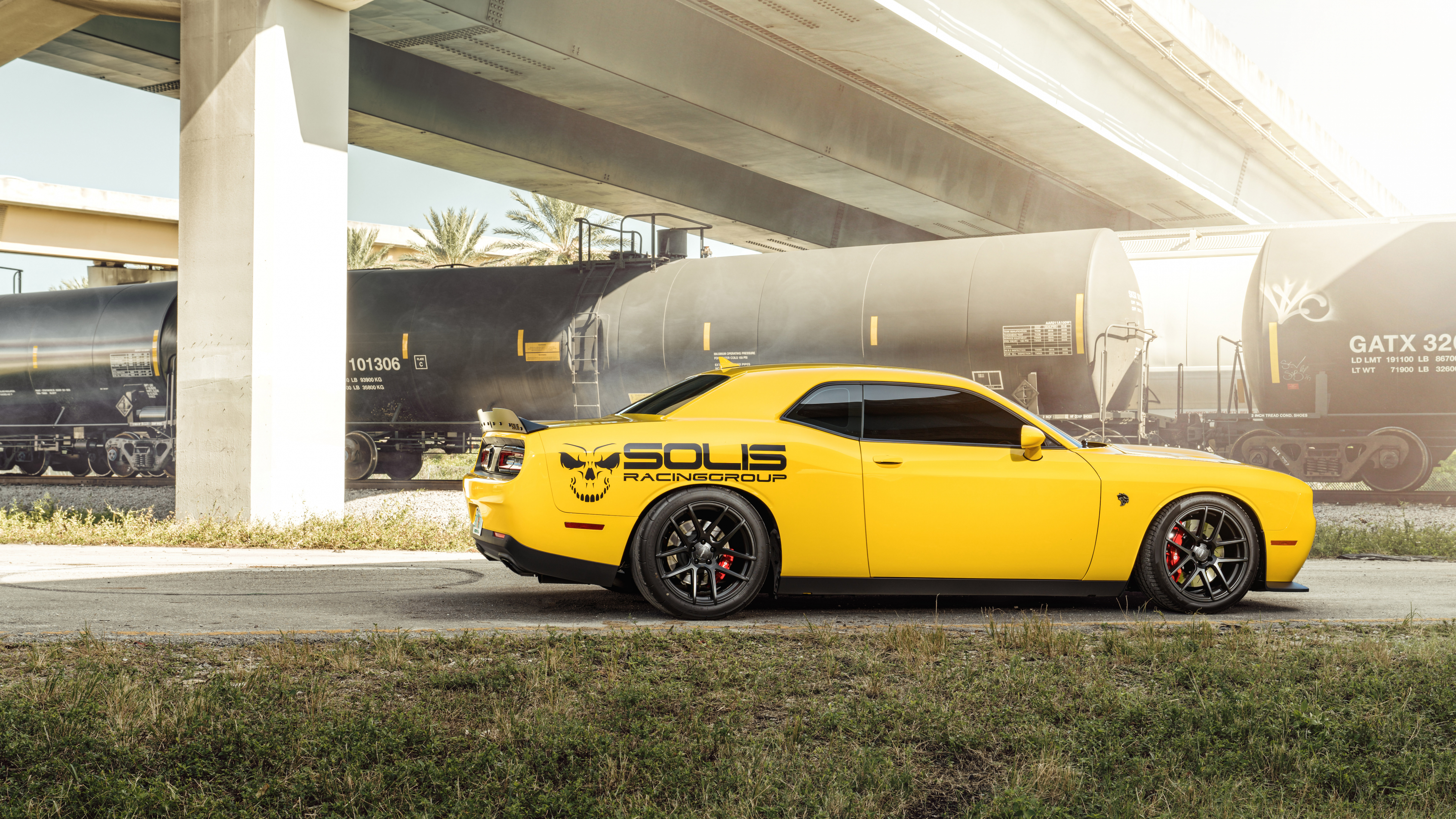 Yellow Coupe Parked on Gray Concrete Ground. Wallpaper in 7680x4320 Resolution
