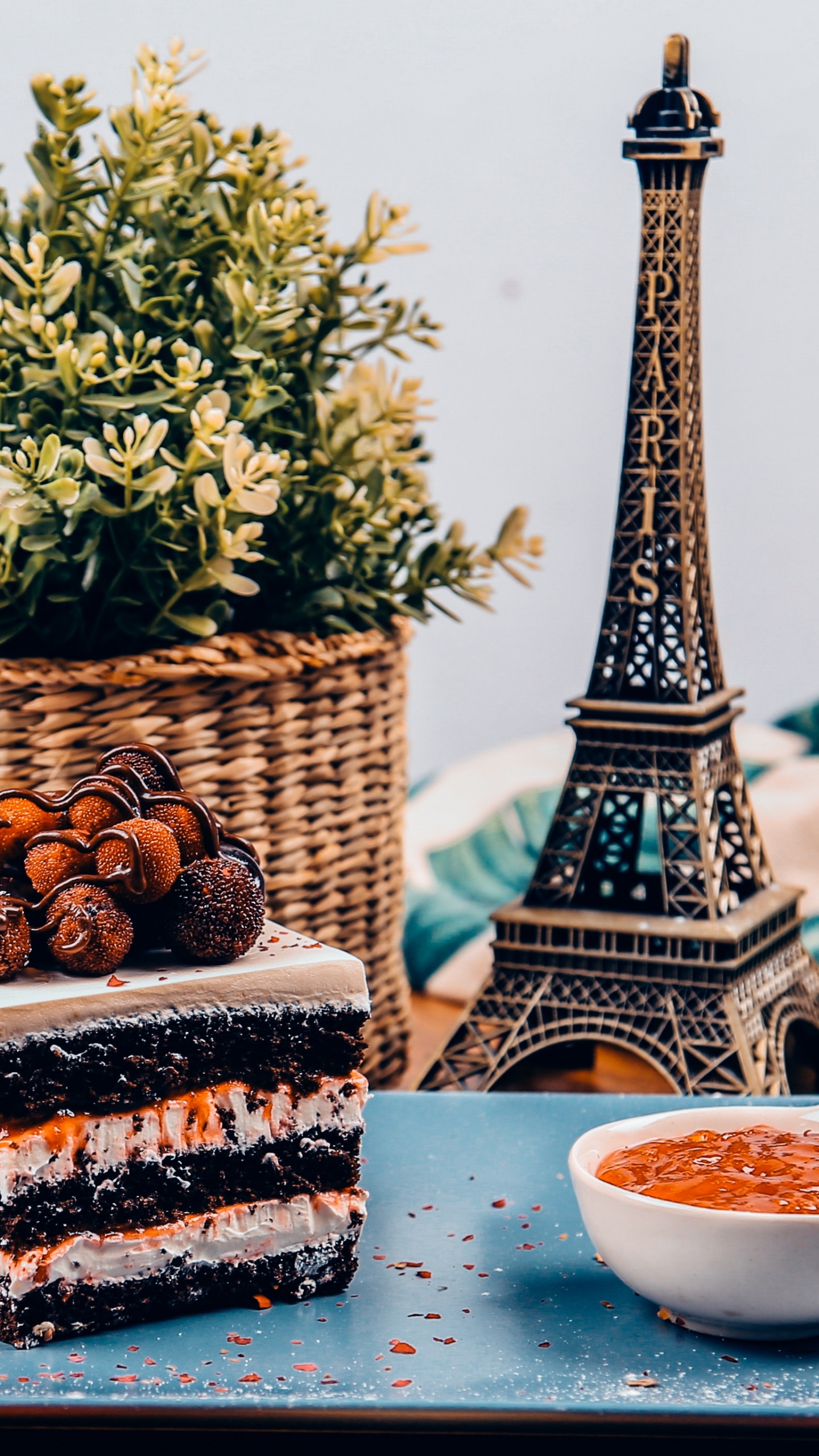 Brown and Black Pine Cone on Blue Ceramic Plate. Wallpaper in 1440x2560 Resolution