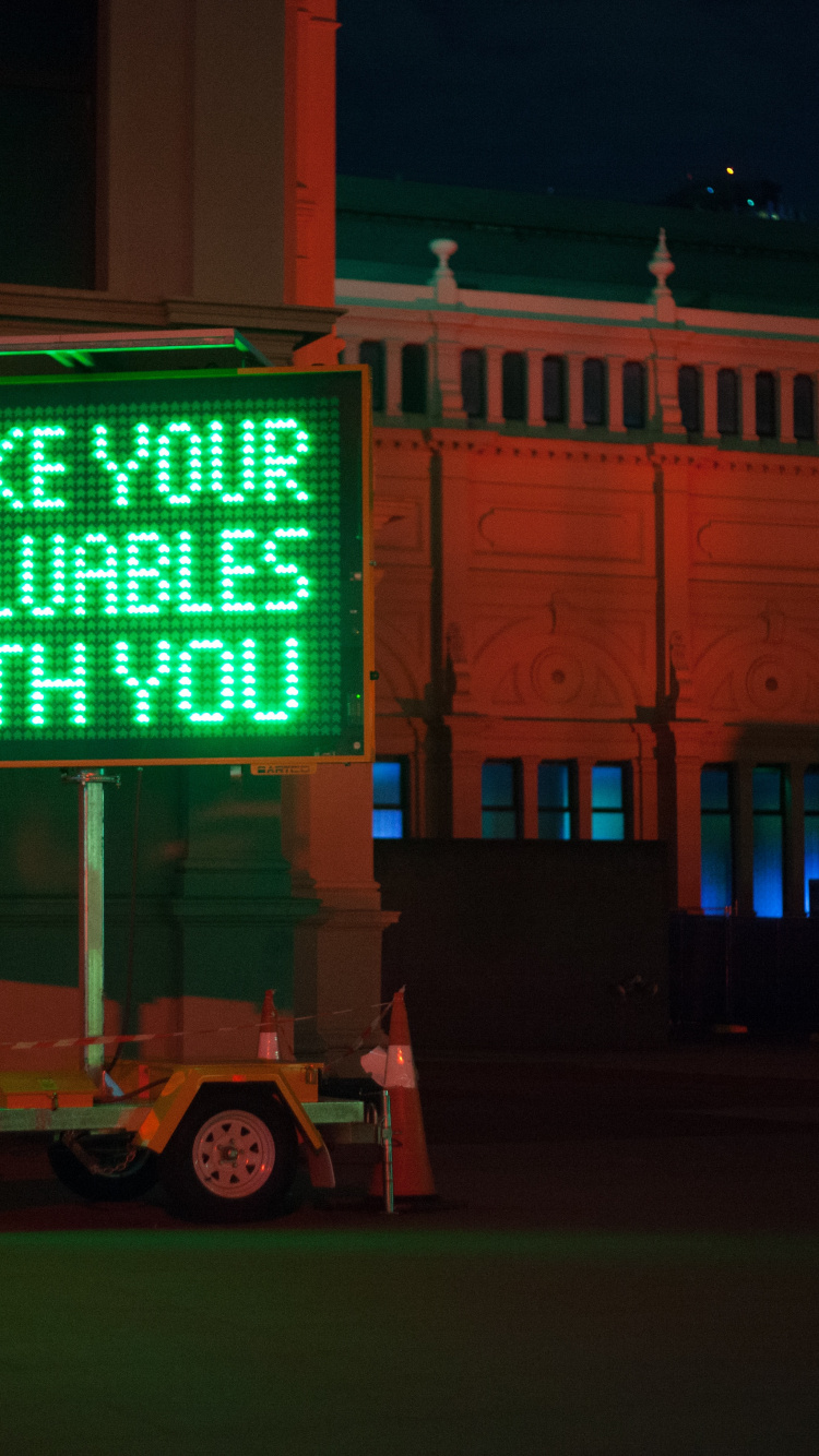Green and Black Led Signage. Wallpaper in 750x1334 Resolution