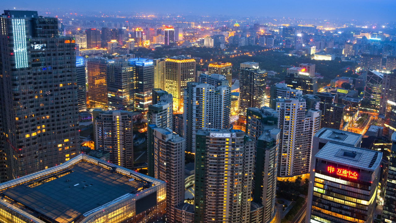 Aerial View of City Buildings During Night Time. Wallpaper in 1280x720 Resolution