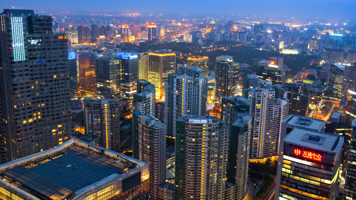 Aerial View of City Buildings During Night Time. Wallpaper in 1366x768 Resolution