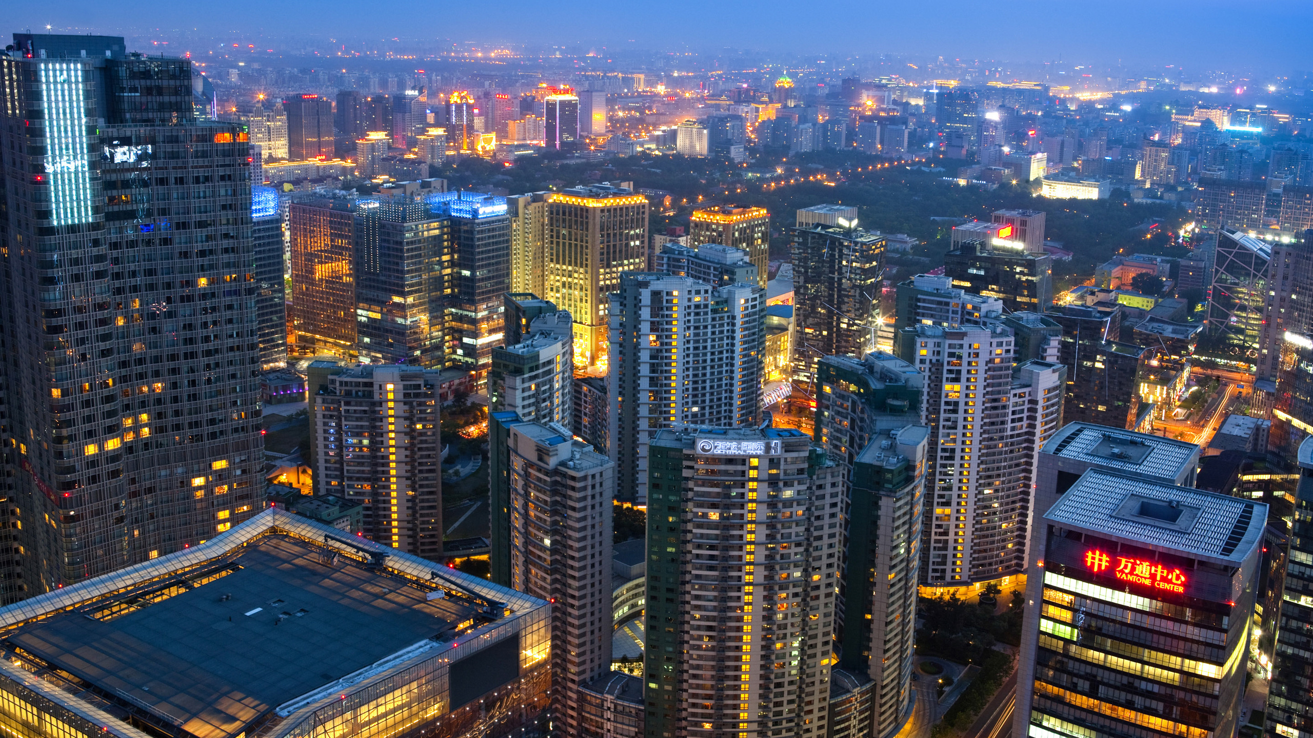 Aerial View of City Buildings During Night Time. Wallpaper in 2560x1440 Resolution