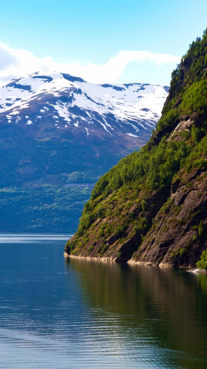 Body of Water Near Mountain During Daytime. Wallpaper in 720x1280 Resolution