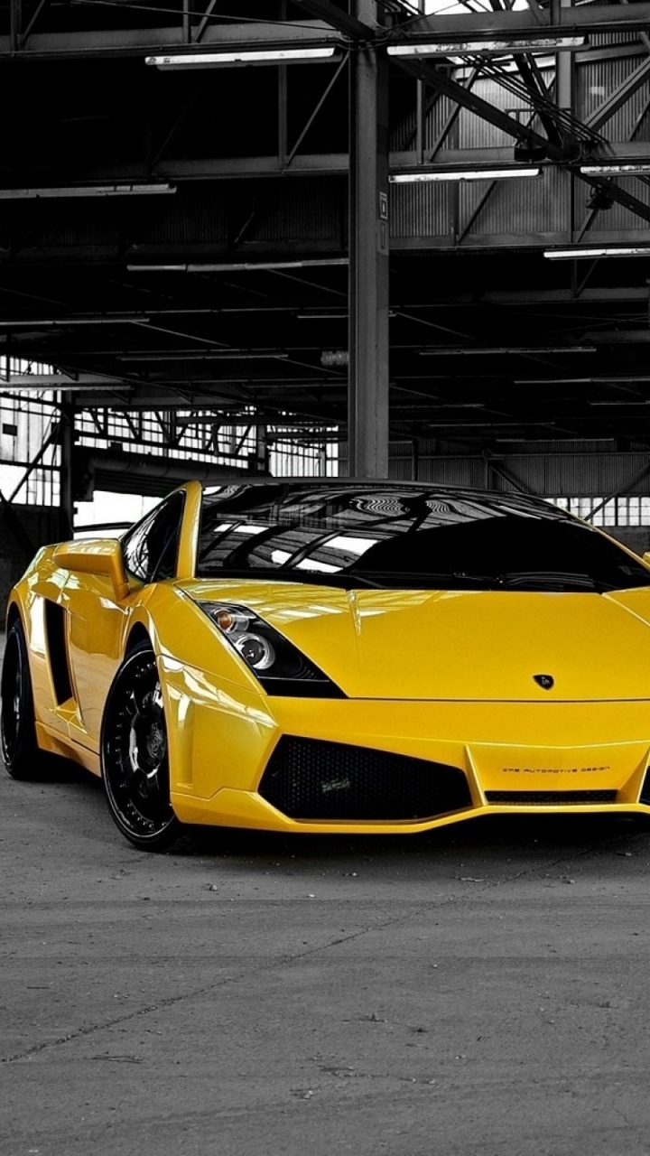 Yellow Lamborghini Aventador Parked on Parking Lot. Wallpaper in 720x1280 Resolution