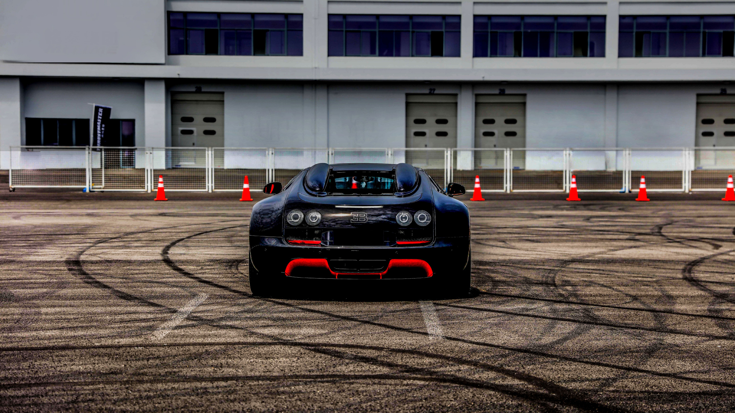 Black Porsche 911 on Road. Wallpaper in 2560x1440 Resolution