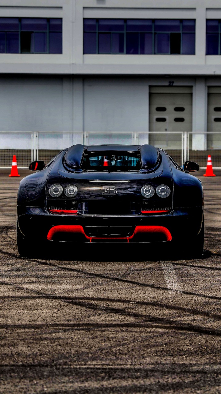 Black Porsche 911 on Road. Wallpaper in 720x1280 Resolution