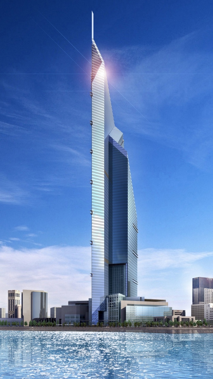 White and Gray High Rise Building Near Body of Water During Daytime. Wallpaper in 720x1280 Resolution