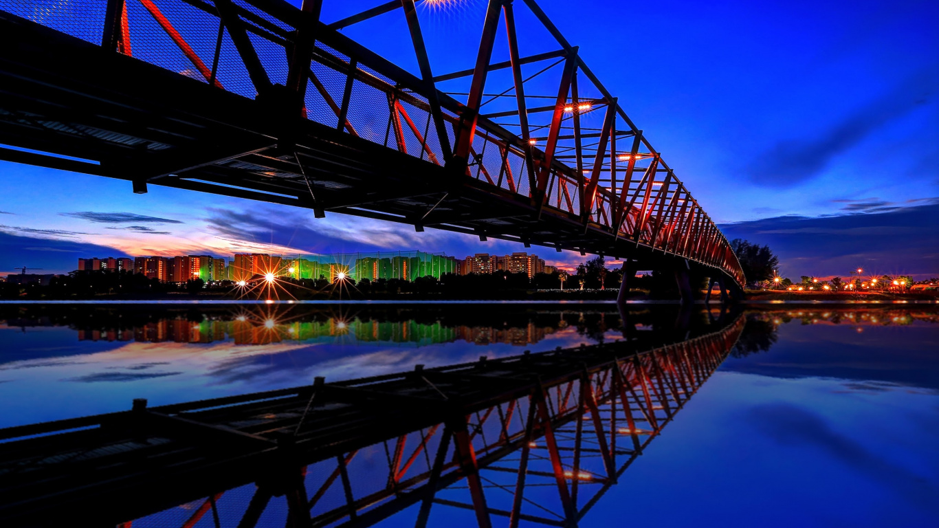 Brown Wooden Bridge Over River During Night Time. Wallpaper in 1366x768 Resolution